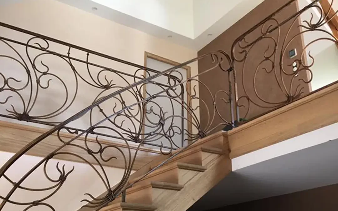 Réalisation d’un escalier en bois et fer forgé